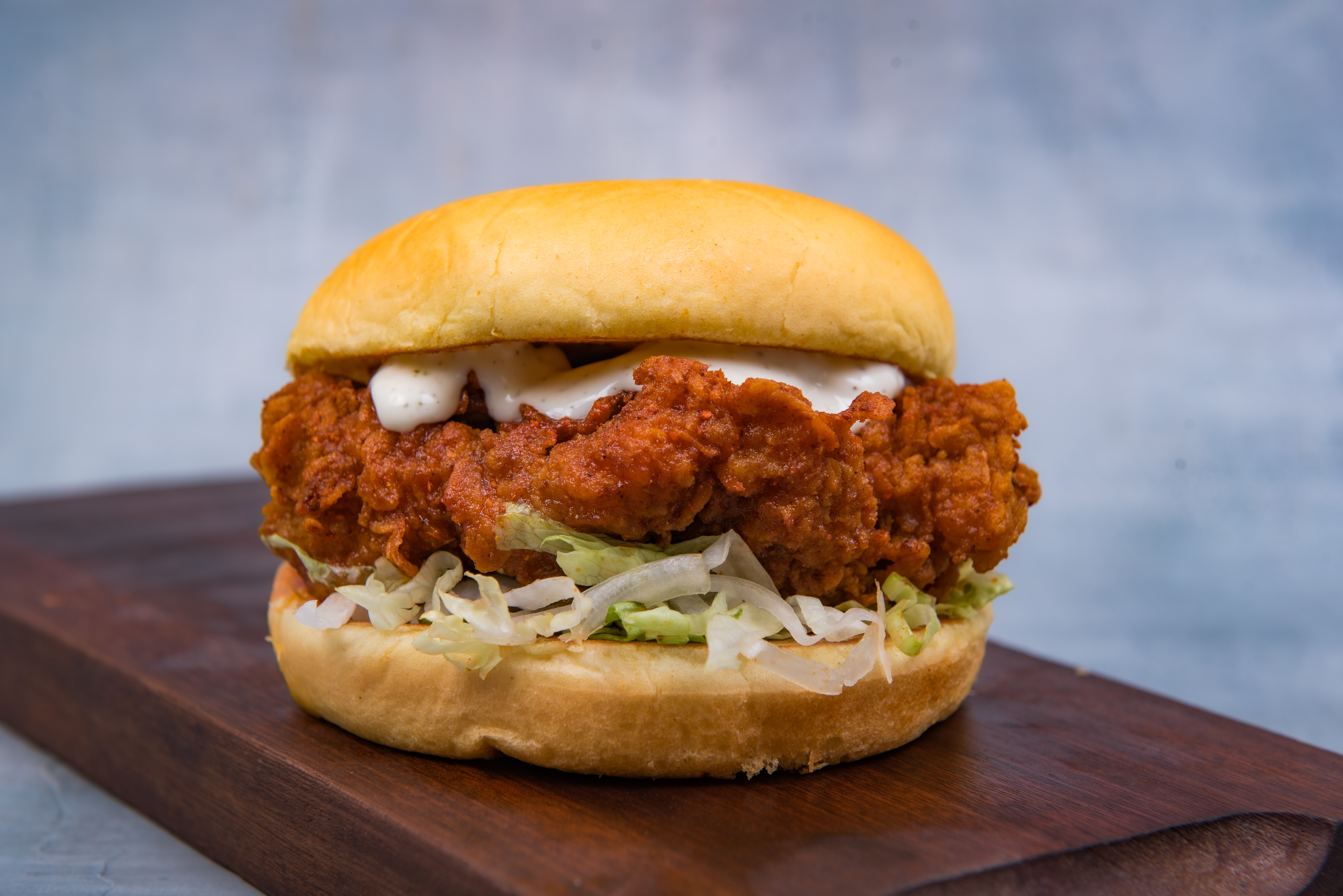 B60 Hot Chicken burger — spicy fried chicken, lettuce, jalapeno, sauce